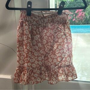 Floral Smocked Ruffle Mini Skirt in Coral